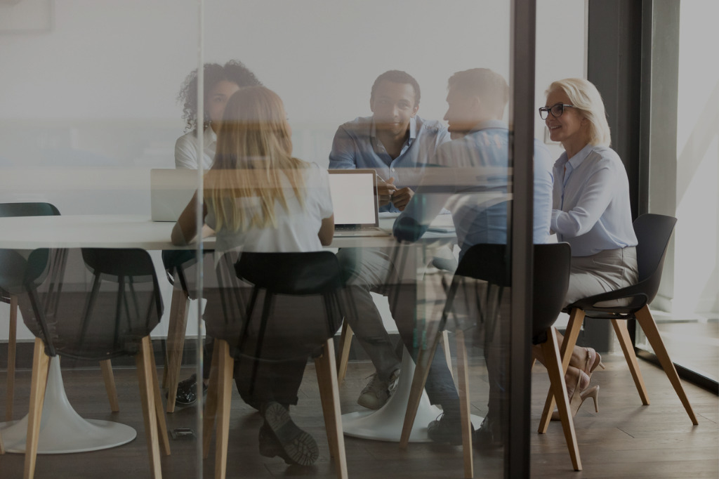 Group of People in Conference Room