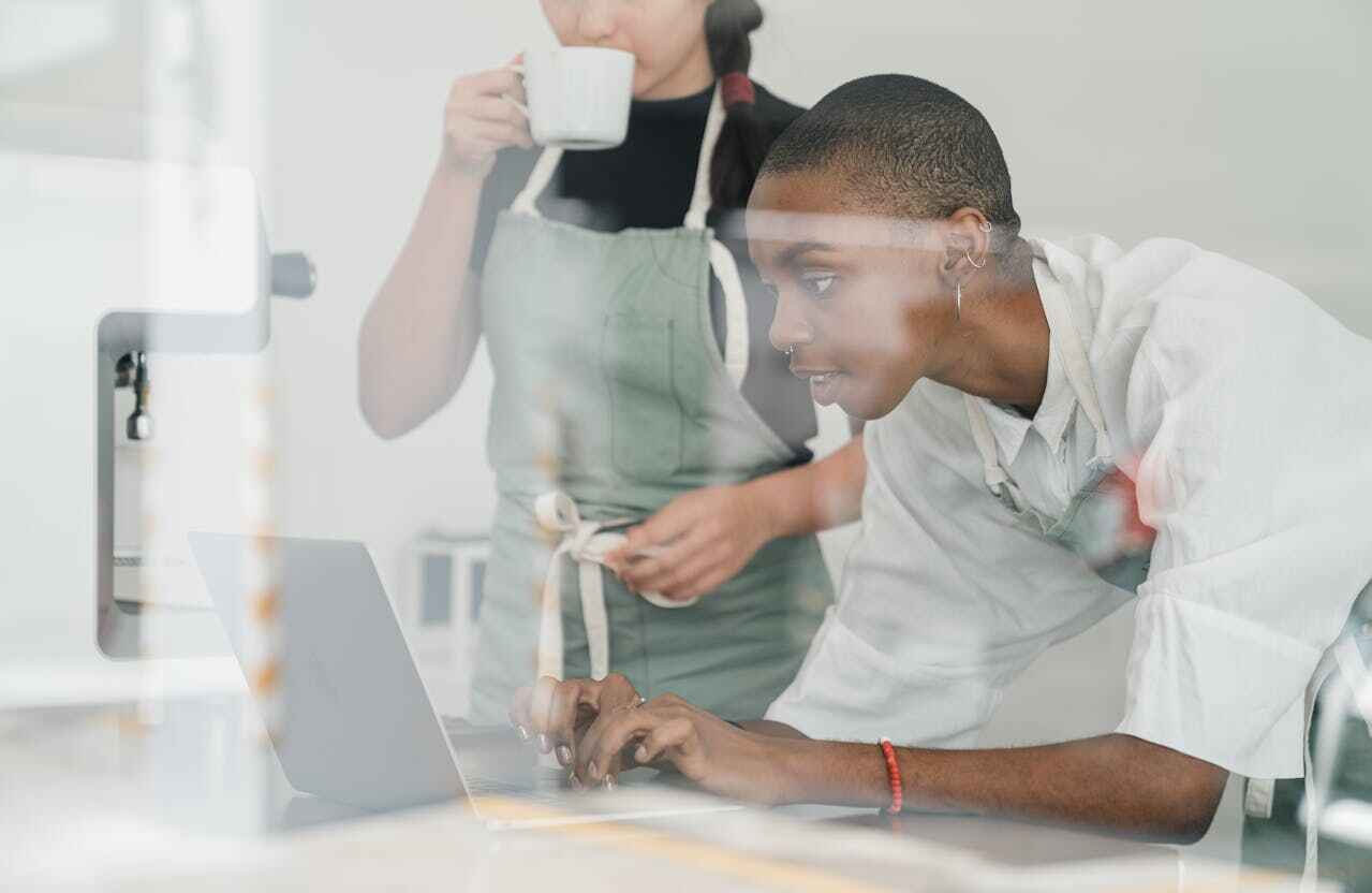 Two Women Working